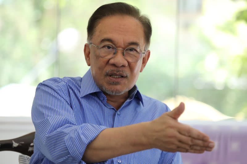 Malaysia's politician Anwar Ibrahim speaks during an interview with Reuters in Petaling Jaya