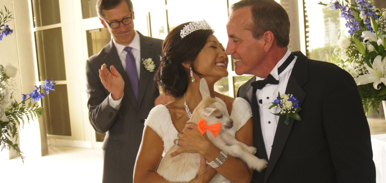 Ed and Kathy Dean hold a goat at their “Celebration of Life.” They hope to receive enough money to donate 1,000 goats —instead of wedding gifts — to villages in Africa. (Photo: Courtesy of Ed and Kathy Dean)