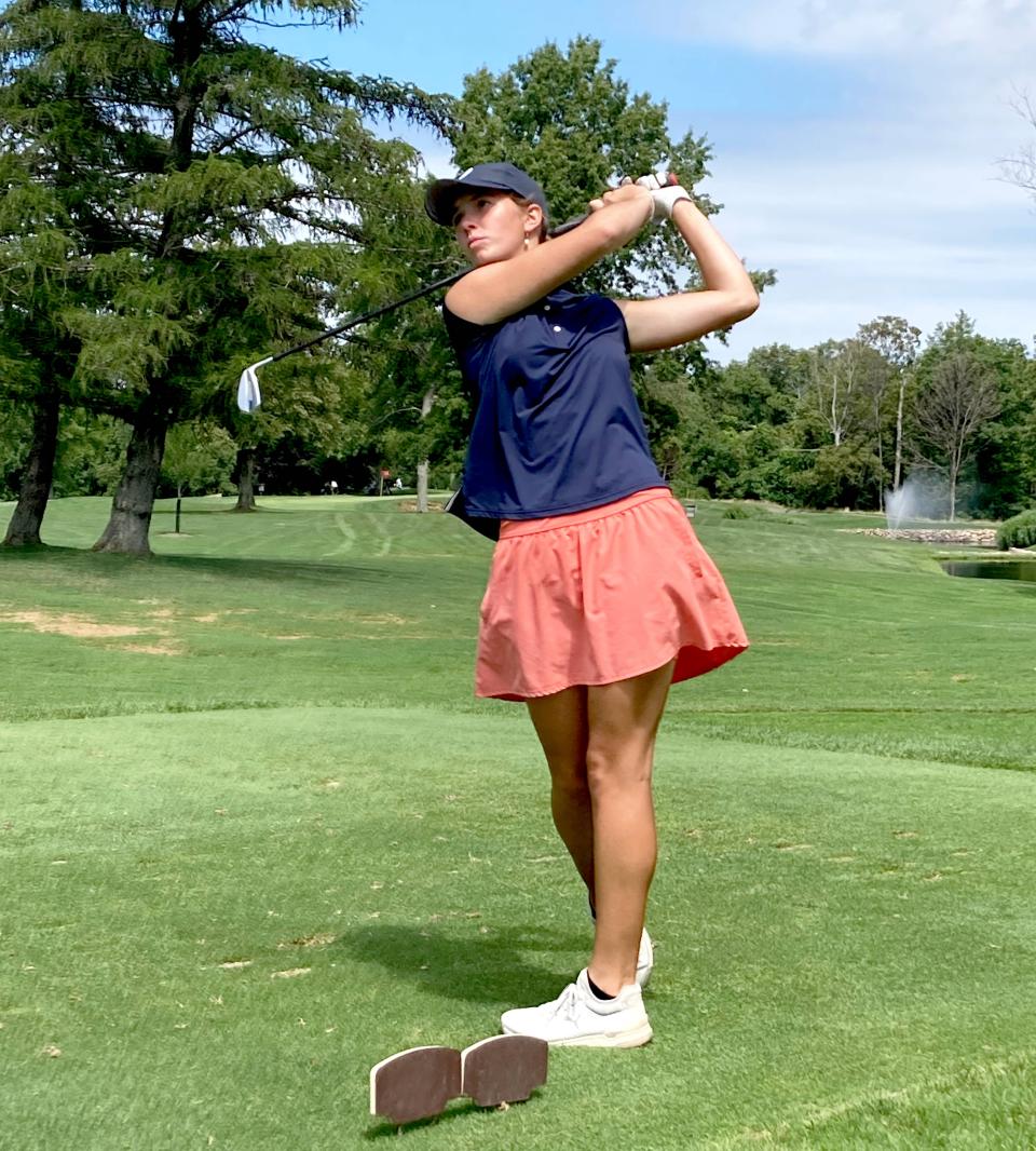 Anna Swan watches her tee shot on Lake View Country Club's seventh hole during Sunday's second round of the EDWGA Stroke Play Tournament. Swan, a North East senior, won with a 36-hole score of 6-over par 150.