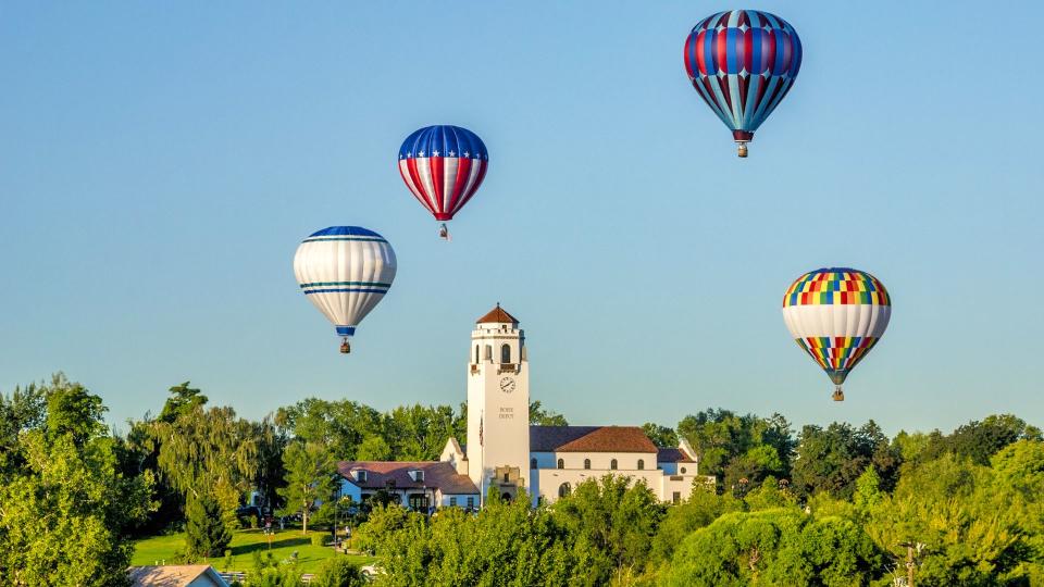 Unique view of hot air ballons around the Boise Train Depot - Image.