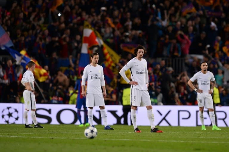 Paris Saint-Germain's crestfallen players after their 6-1 defeat to Barcelona during their Champions League match at the Nou Camp stadium on March 8, 2017