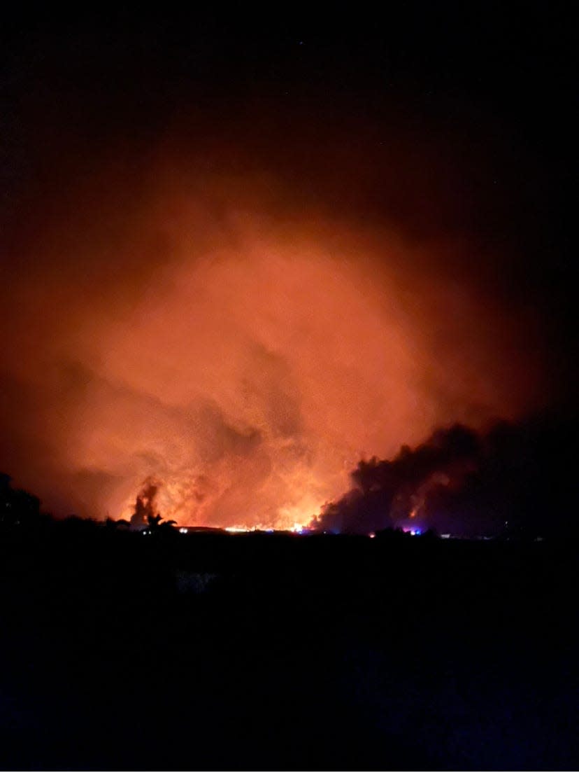 Smoke from Maui wildfires fill the air on the west coast of the island.