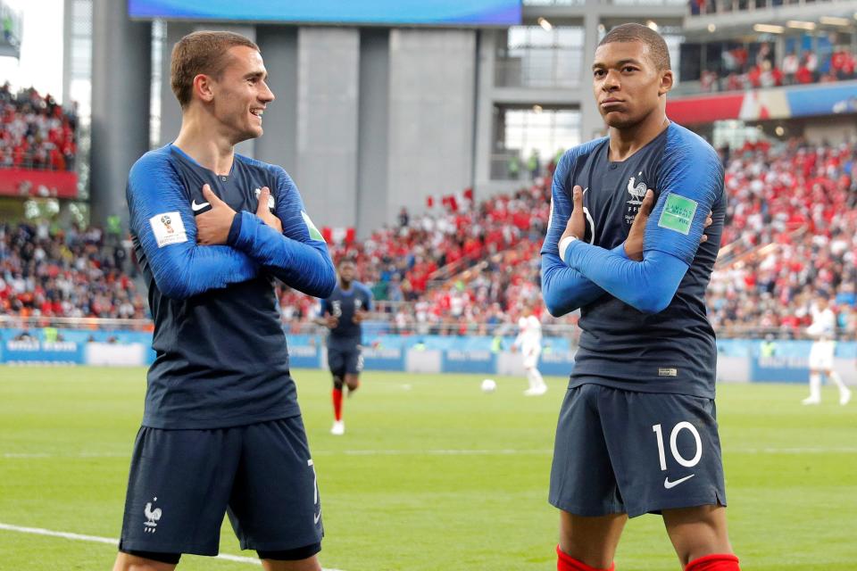 <p>Kylian Mbappe and Antoine Griezmann celebrate in typically French style after sending Les Bleus 1-0 up. (EFE) </p>