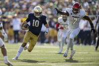 Notre Dame quarterback Drew Pyne (10) runs the ball toward the end zone during the second quarter of an NCAA college football game against UNLV, Saturday, Oct. 22, 2022, in South Bend, Ind. (AP Photo/Marc Lebryk)
