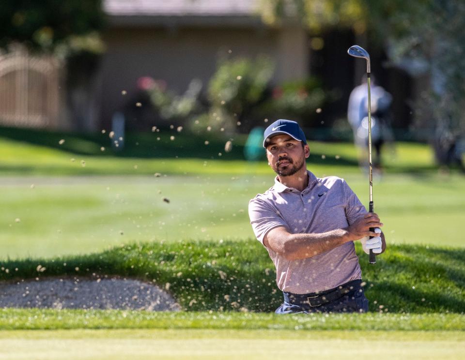 Jason Day hits from a bunker onto the 14th green during round three of The American Express at La Quinta Country Club in La Quinta, Calif., Saturday, Jan. 21, 2023. 