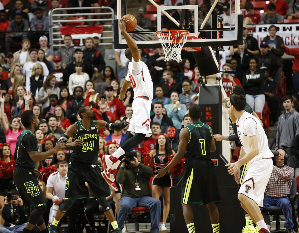 Texas Tech's Jaye Crockett (30) dunks against Baylor during an NCAA college basketball game in Lubbock, Texas, Wednesday, Jan, 15, 2014. (AP Photo/Lubbock Avalanche-Journal, Tori Eichberger) ALL LOCAL TV OUT