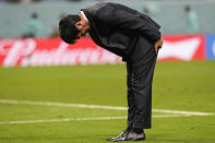 Japan's head coach Hajime Moriyasu bows after losing the penalty shootout of the World Cup round of 16 soccer match between Japan and Croatia at the Al Janoub Stadium in Al Wakrah, Qatar, Monday, Dec. 5, 2022. (AP Photo/Frank Augstein)