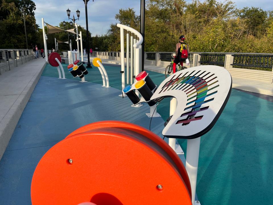 FILE - The new Fifth Street pedestrian bridge in Augusta, GA, includes a small playground with a variety of interactive activities.