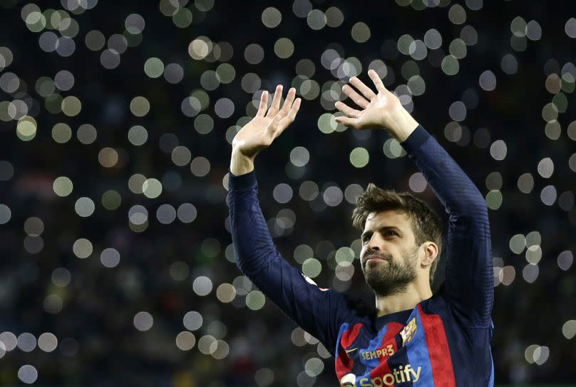 Barcelona's Gerard Pique waves to supporters at the end of Spanish La Liga soccer match between Barcelona and Almeria at the Camp Nou stadium in Barcelona, Spain, in 2022