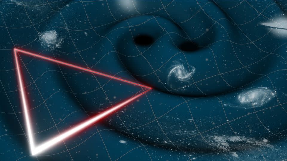 An illustration shows the laser triangle configuration of the LISA mission, which will use three spacecraft to detect gravitational waves, which are depicted emanating from two black holes. - ESA