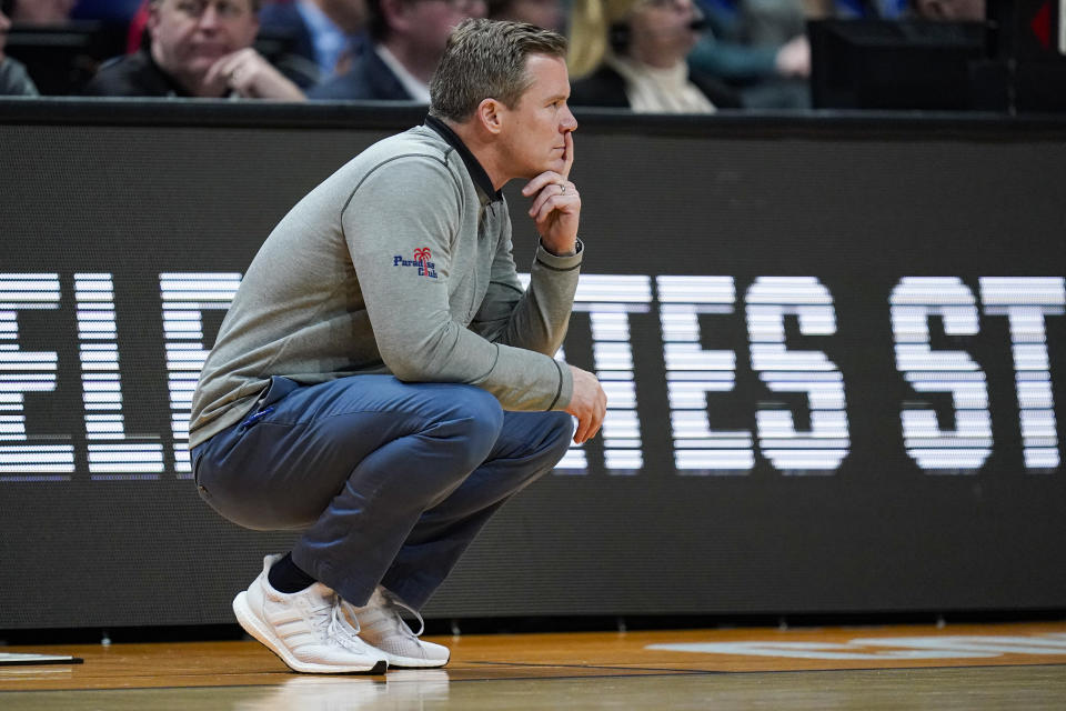 Florida Atlantic head coach Florida Atlantic watches his team play against Memphis in the second half of a first-round college basketball game in the men's NCAA Tournament in Columbus, Ohio, Friday, March 17, 2023. (AP Photo/Michael Conroy)