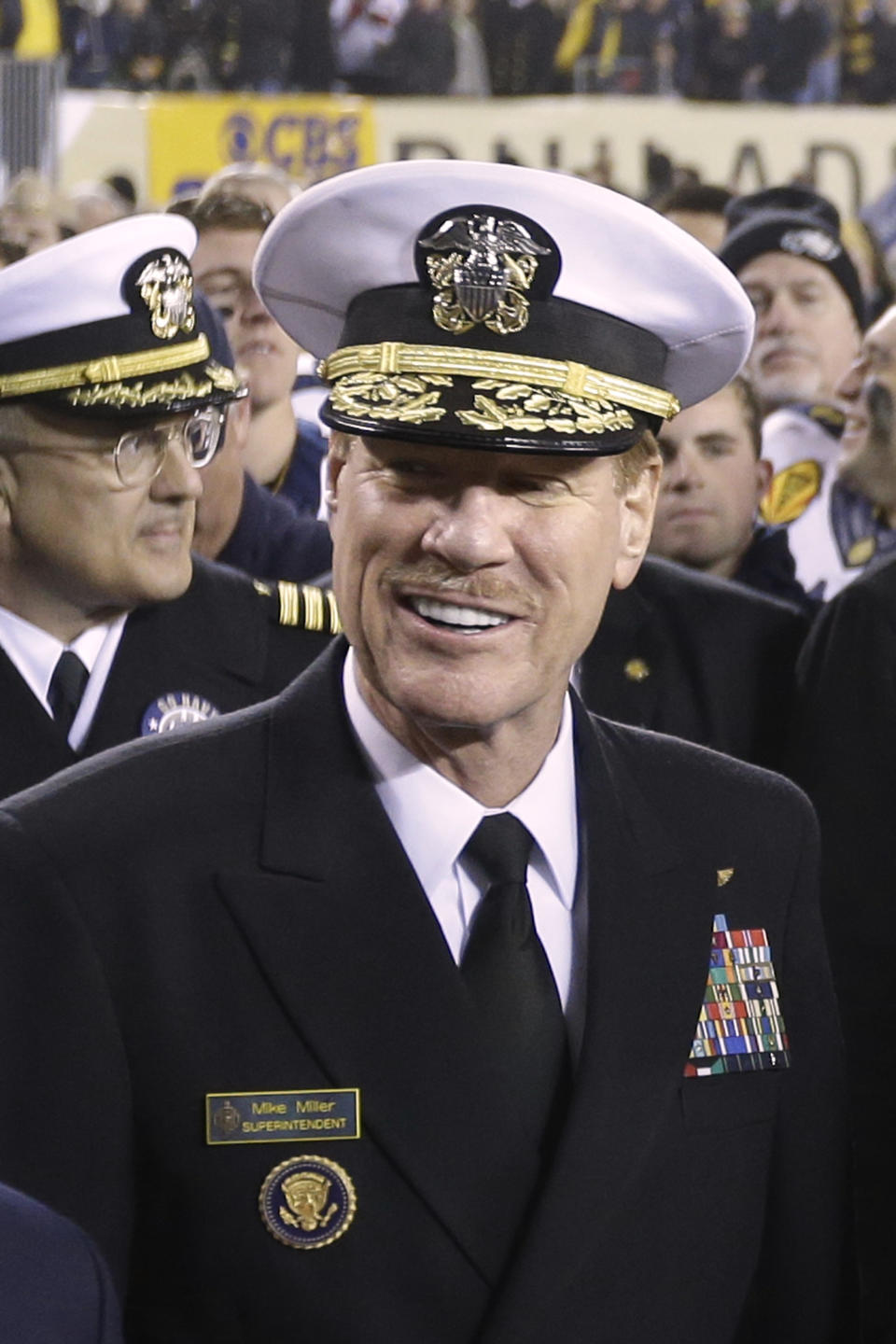 FILE - In this Dec. 8, 2012 file photo, U.S. Naval Academy Superintendent Vice Adm. Michael Miller poses for photographs after the Army-Navy NCAA college football game in Philadelphia. Miller is set to testify Friday as part of a hearing for a student charged in a sexual assault case. Lawyers for the student say political pressure influenced Miller, to pursue charges against the student, Joshua Tate of Nashville, Tenn. (AP Photo/Matt Rourke, File)