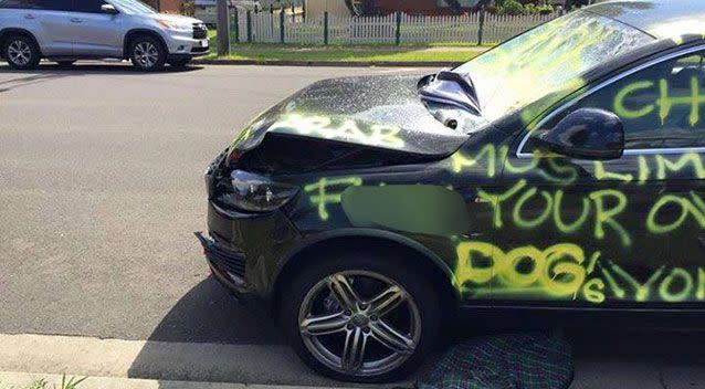 The anti-Muslim slogans were sprayed all over the car. Photo: Facebook/Queen Street Group