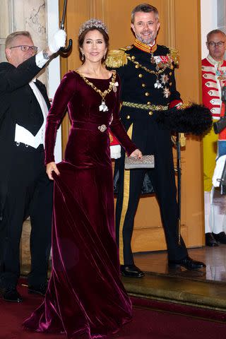 <p>Keld Navntoft / Ritzau Scanpix / AFP via Getty</p> Crown Princess Mary and Crown Prince Frederik at Amalienborg Palace on Jan. 1.