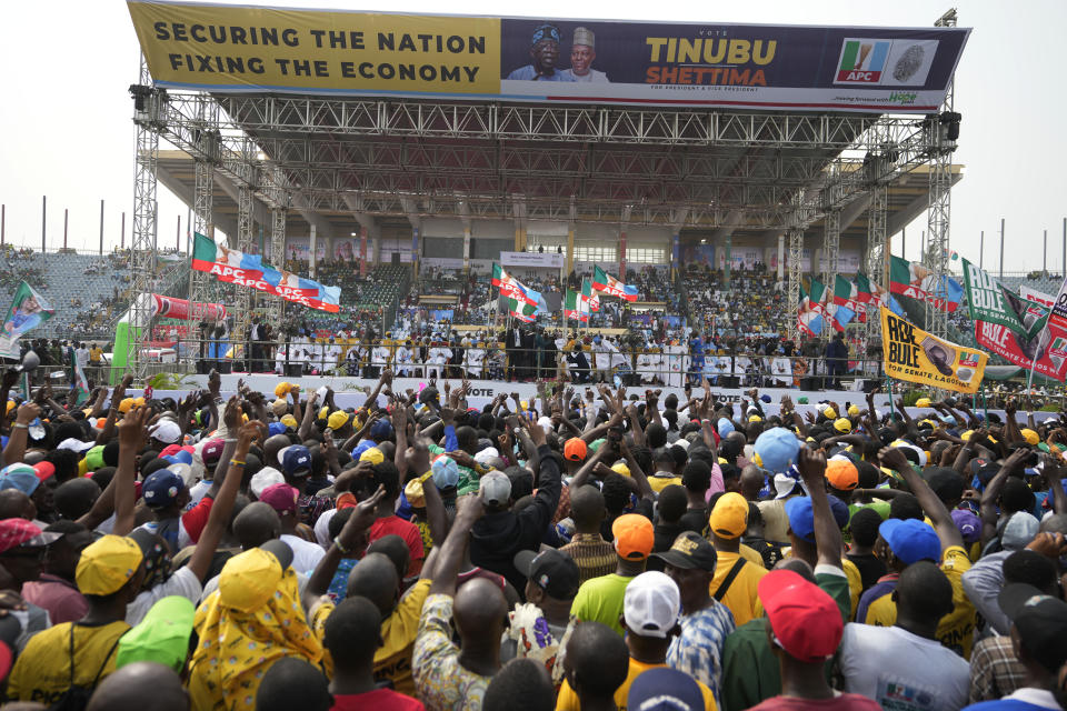 Supporters of Bola Ahmed Tinubu, presidential candidate of the All Progressives Congress, Nigeria ruling party during an election campaign rally at the Teslim Balogun Stadium in Lagos Nigeria, Tuesday, Feb. 21, 2023. Fueled by high unemployment and growing insecurity, younger Nigerians are mobilizing in record numbers to take part in this month's presidential election. (AP Photo/Sunday Alamba)