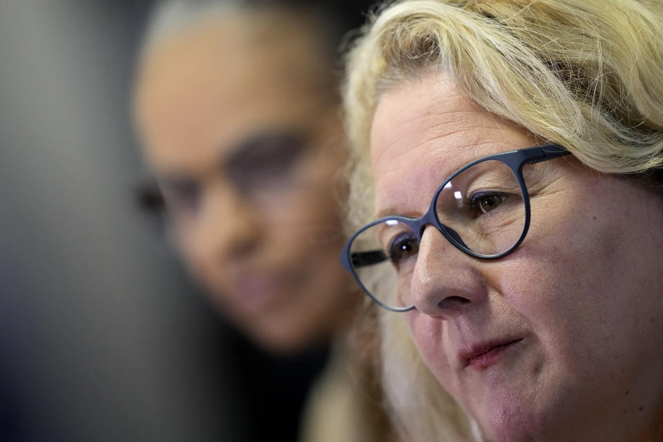 Germany's Economic Cooperation and Development Minister Svenja Schulze gives a statement with Brazil's Environment Minister Marina Silva, behind, in Brasilia, Brazil, Monday, Jan. 30, 2023. (AP Photo/Eraldo Peres)