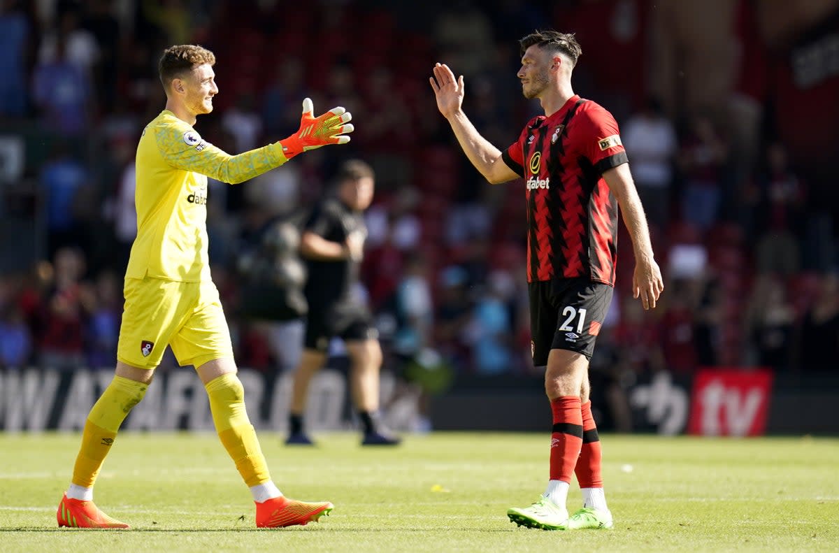 Bournemouth goalkeeper Mark Travers (left) and Kieffer Moore celebrate after the win over Aston Villa (Andrew Matthews/PA) (PA Wire)