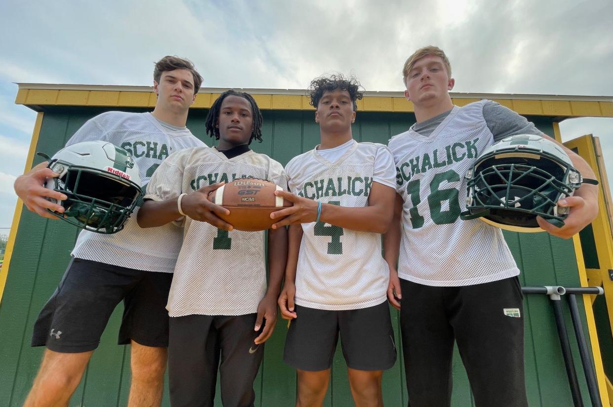 The Schalick High School football program won its first playoff game since 2007 with a 35-0 triumph over Audubon in the Central Jersey Group 1 quarterfinals on Oct. 27, 2023. Pictured (from left): Jake Siedlecki, Kenai Simmons, Reggie Allen Jr. and Riley Papiano.