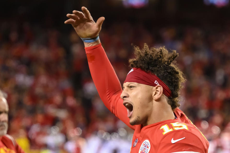Kansas City Chiefs quarterback Patrick Mahomes shouts to the crowd as the Chiefs defense makes a stand against the Tennessee Titans during overtime in an NFL football game, Sunday, Nov. 6, 2022 in Kansas City, Mo. (AP Photo/Reed Hoffmann)