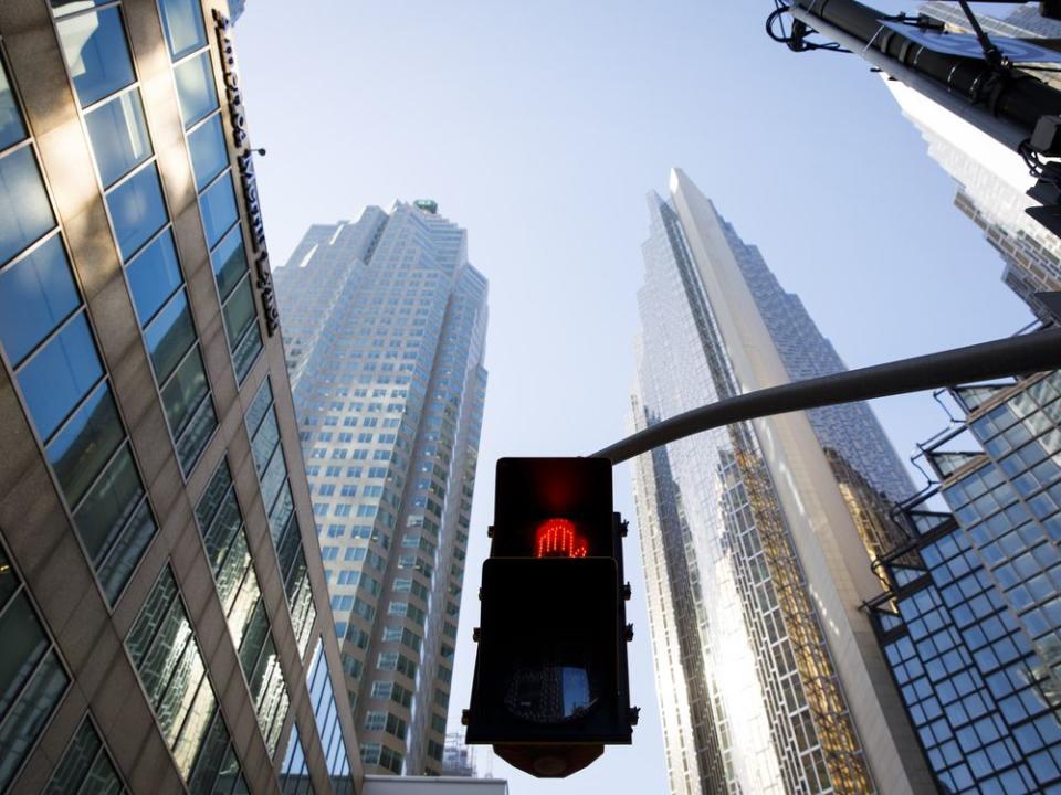  A crosswalk sign flashes red in Toronto’s financial district.