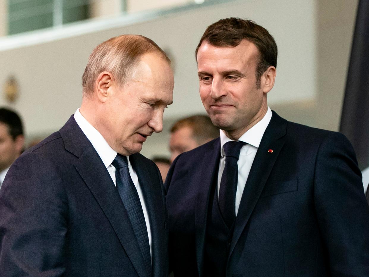 Emmanuel Macron, right, and Vladimir Putin, left.