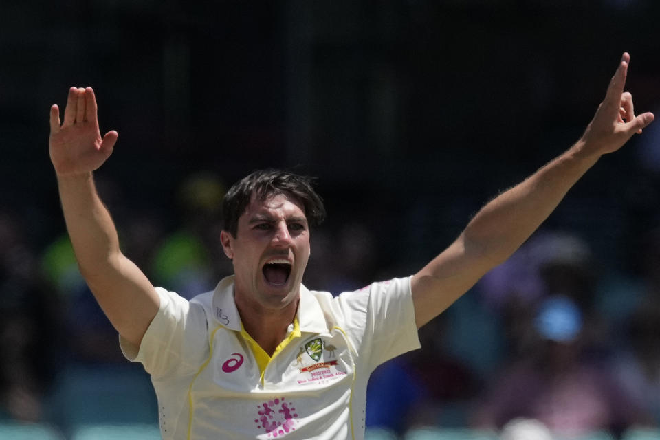 Australia's Pat Cummins appeals for a LBW decision on South Africa's Dean Elgar during the fifth day of their cricket test match at the Sydney Cricket Ground in Sydney, Sunday, Jan. 8, 2023. (AP Photo/Rick Rycroft)