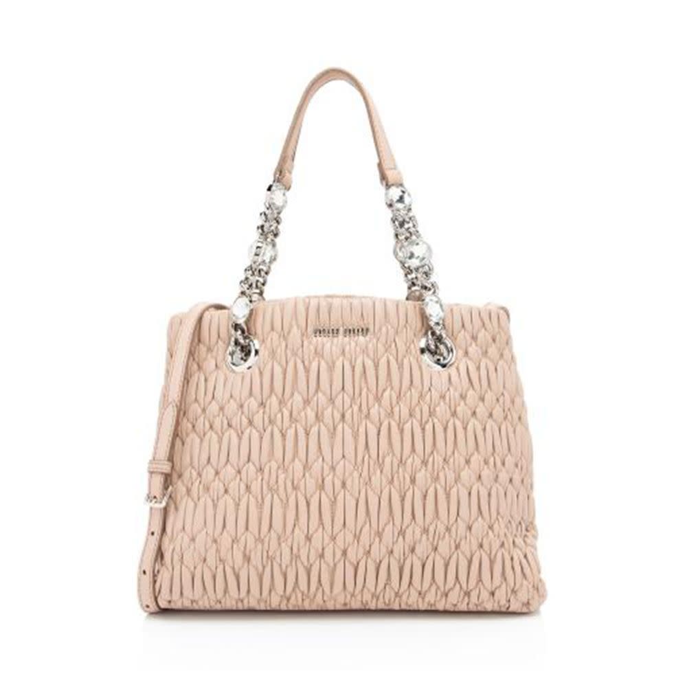 <p><a href="https://go.redirectingat.com?id=74968X1596630&url=https%3A%2F%2Fwww.bagborroworsteal.com%2Fhandbags%2Fmiu-miu-matelasse-nappa-leather-crystal-tote%2F206495%2F3165%2F1269596%26posRow%3D3%26posCol%3D1%26page%3D9&sref=https%3A%2F%2F" rel="nofollow noopener" target="_blank" data-ylk="slk:Shop Now;elm:context_link;itc:0;sec:content-canvas" class="link rapid-noclick-resp">Shop Now</a></p><p>Crystal Tote</p><p>bagborroworsteal.com</p><p>$950.00</p>