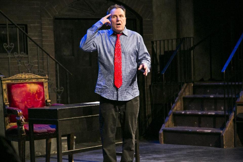 This theater image released by Keith Sherman and Associates shows Colin Quinn performing his one-man show, "Colin Quinn Unconstitutional," in New York. (AP Photo/Keith Sherman and Associates, Mike Lavoie)