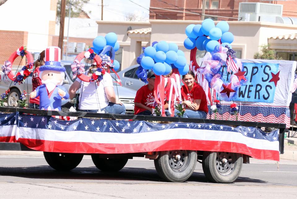 Tharp's Flowers entered a spirited float for the Fourth of July Parade.