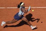 FILE - Coco Gauff of the United States returns the ball to Poland's Iga Swiatek during their match at the Italian Open tennis tournament at Rome's Foro Italico, Thursday, May 16, 2024. (AP Photo/Andrew Medichini, File)
