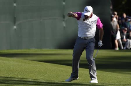 Apr 10, 2016; Augusta, GA, USA; Lee Westwood reacts after an eagle putt on the 15th green during the final round of the 2016 The Masters golf tournament at Augusta National Golf Club. Mandatory Credit: Michael Madrid-USA TODAY Sports