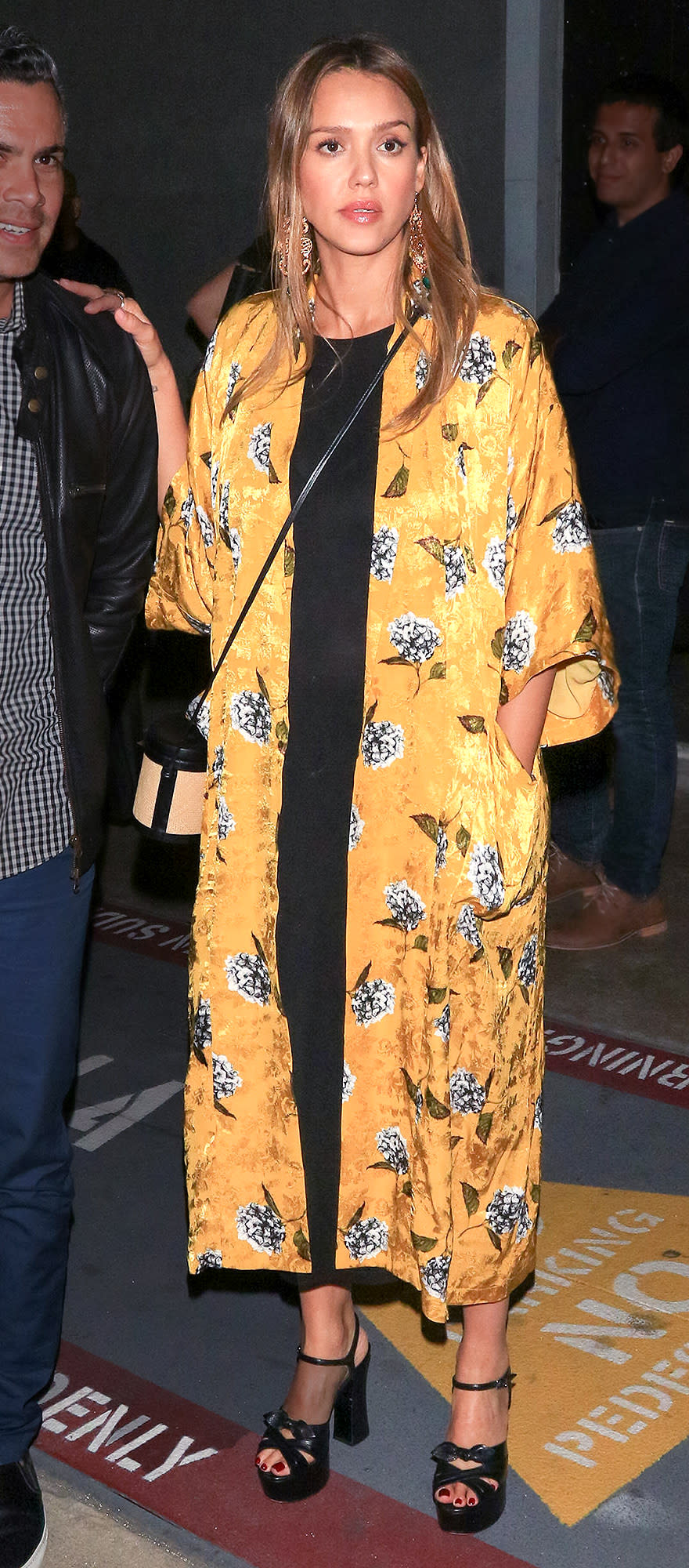 <p>The <em><span>Sin City</span> </em>star looks comfortable and stylish in Topshop's <span>Floral Print Maxi Kimono Jacket</span> ($130) on Aug. 17, attending the opening night of <em>Hamilton</em> at the Pantages Theater in Hollywood, California. <strong>Finish the Look!</strong> Steve Madden Verdict Platform Sandal ($100), <span>nordstrom.com</span></p>