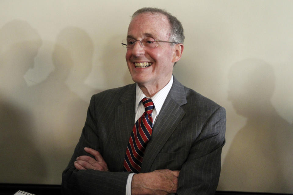 University of Nebraska-Lincoln Chancellor Harvey Perlman smiles during an interview after a media availability after a BCS presidential oversight committee meeting, Tuesday, June 26, 2012, in Washington. The committee announced a new post-season format for a four-team playoff for the major college football national championship. (AP Photo/Alex Brandon)