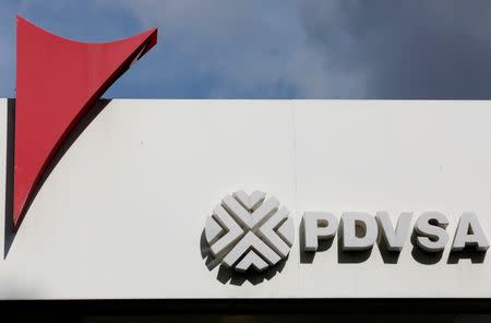 The logo of the Venezuelan oil company PDVSA is seen on a gas station in Caracas, Venezuela July 21, 2016. Picture taken July 21, 2016. REUTERS/Carlos Jasso