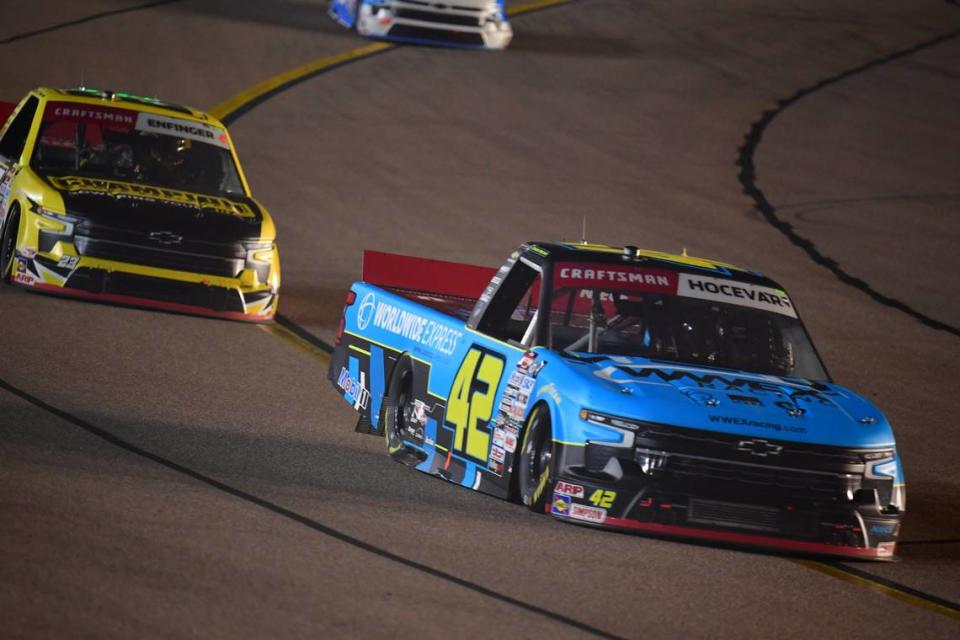 Nov 3, 2023; Avondale, Arizona, USA; NASCAR Gander RV and Outdoors Truck Series driver Carson Hocevar (42) leads driver Grant Enfinger (23) during the Truck Series Championship at Phoenix Raceway.