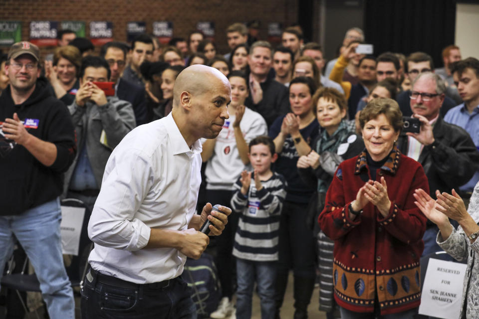 New Jersey Democratic Sen. Cory Booker exits the stage after speaking at a get out the vote event hosted by the NH Young Democrats at the University of New Hampshire in Durham, N.H. Sunday, Oct. 28, 2018. (AP Photo/ Cheryl Senter)