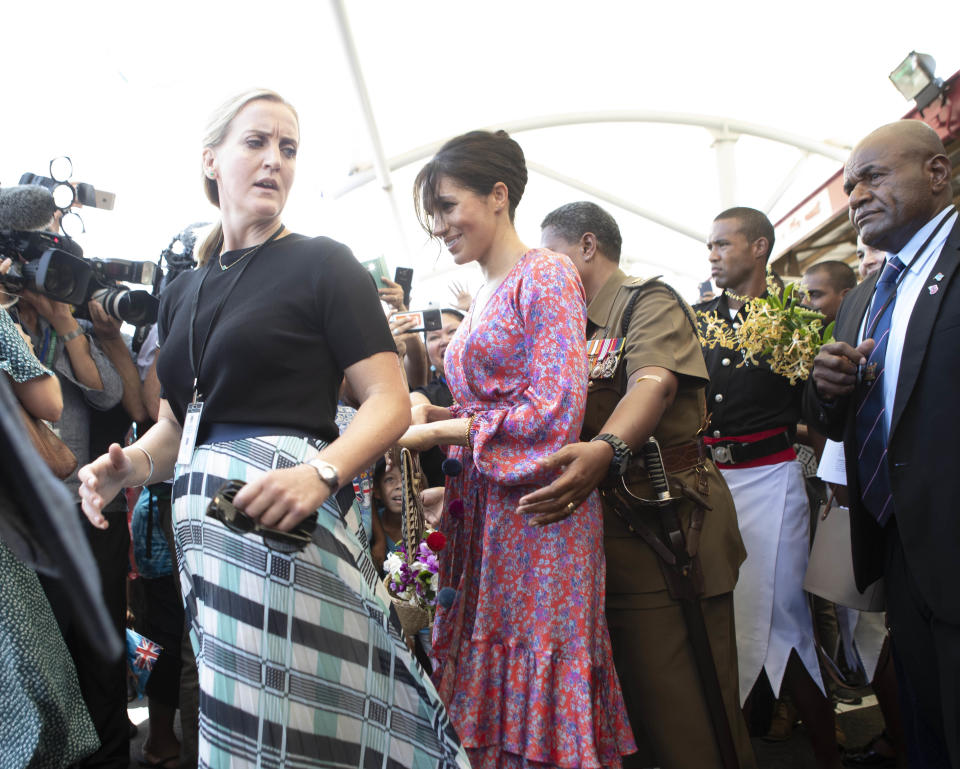 Meghan Markle ran into a security risk when she visited a marketplace in Suva, forcing palace aides to cut the engagement short and whisk the Duchess out of there. Photo: Getty Images