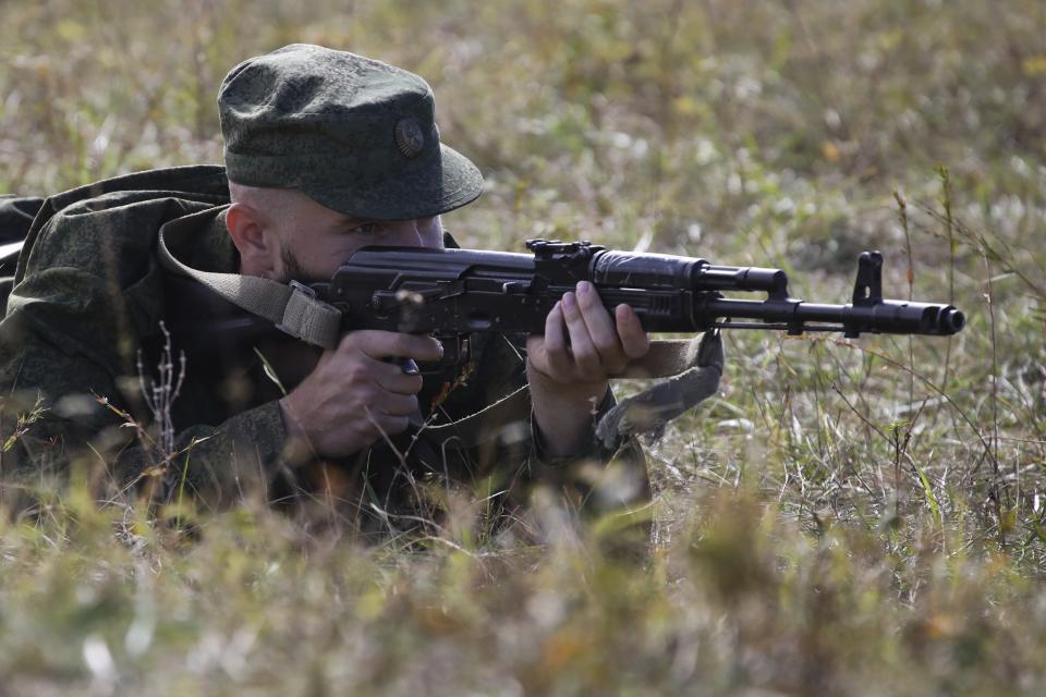 A recruit attends a military training at a firing range in the Krasnodar region in southern Russia, Tuesday, Oct. 4, 2022. Russian Defense Minister Sergei said that the military has recruited over 200,000 reservists as part of a partial mobilization launched two weeks ago. (AP Photo)