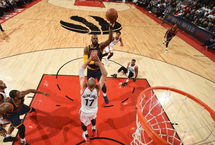 LeBron takes one of a few left-handed floaters against the Raptors. (Getty)