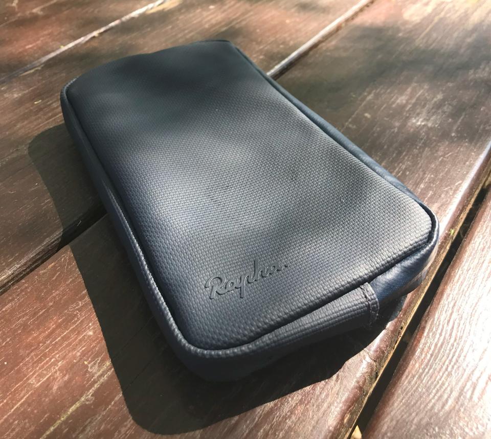 Rapha Rainproof Essentials Case – Large outside on picnic table