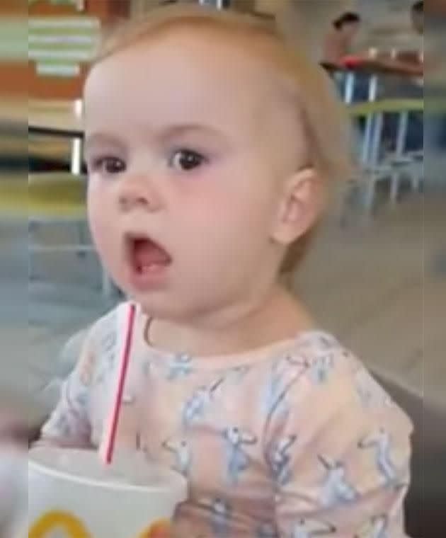 Evie tries Coke for the first time. Photo: Facebook