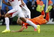 Arjen Robben of the Netherlands is fouled by Costa Rica's Cristian Gamboa during their 2014 World Cup quarter-finals at the Fonte Nova arena in Salvador July 5, 2014. REUTERS/Marcos Brindicci (BRAZIL - Tags: SOCCER SPORT WORLD CUP)