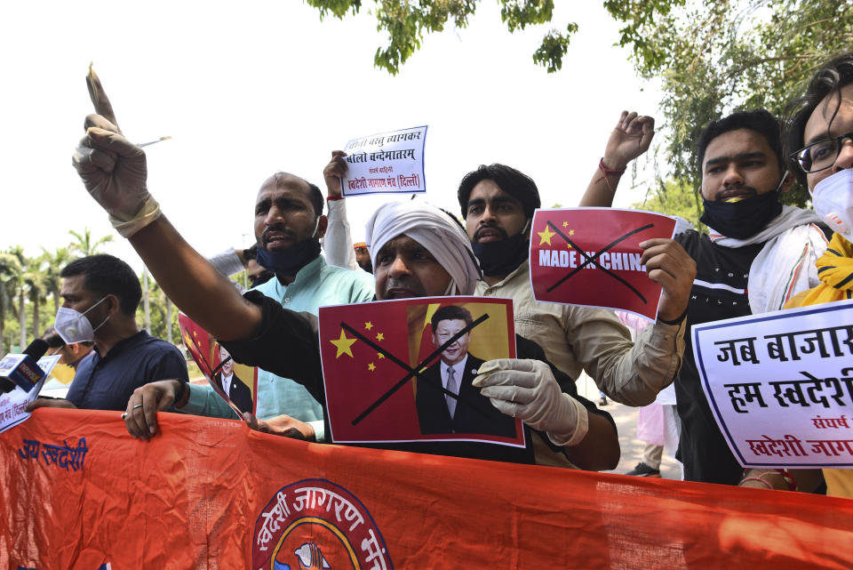 Activists of Swadeshi Jagran Manch shout slogans during a protest near the Chinese embassy in New Delhi, India, Wednesday, June 17, 2020. As some commentators clamored for revenge, India's government was silent Wednesday on the fallout from clashes with China's army in a disputed border area in the high Himalayas that the Indian army said claimed 20 soldiers' lives. An official Communist Party newspaper said the clash occurred because India misjudged the Chinese army’s strength and willingness to respond. (AP Photo)