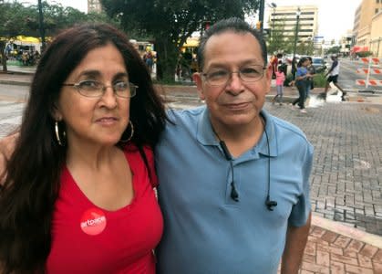 FILE PHOTO: Hispanic voters Roger Luna and his friend Dolores Alvarez pose for a photograph in San Antonio, Texas, Oct. 13, 2018. REUTERS/Tim Reid/File Photo