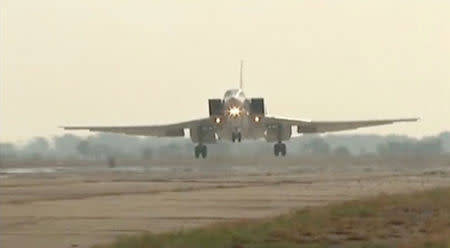 A still image, taken from video footage and released by Russia's Defence Ministry on August 18, 2016, shows a Russian Tupolev Tu-22M3 long-range bomber landing at an air base near the Iranian city of Hamadan. Ministry of Defence of the Russian Federation/Handout via REUTERS TV