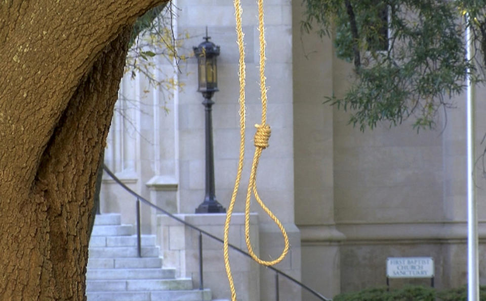 A noose hangs on a tree on the state Capitol grounds in Jackson, Miss., on Monday. A Mississippi official says two nooses and six signs were found on Capitol grounds. (Photo: WLBT-TV via AP)