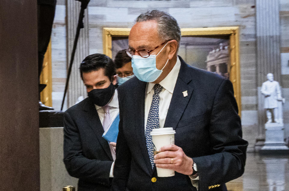 Senate Minority Leader Chuck Schumer of N.Y., arrives at the office of House Speaker Nancy Pelosi at the Capitol to resume talks with White House chief of staff Mark Meadows and Treasury Secretary Steven Mnuchin on a COVID-19 relief bill, Saturday, Aug. 1, 2020, in Washington. (AP Photo/Manuel Balce Ceneta)