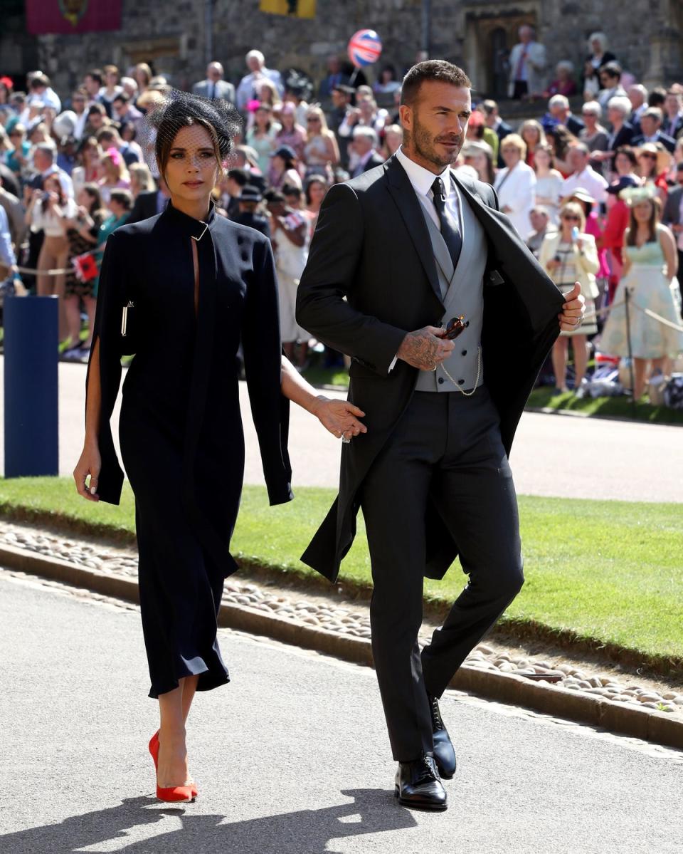 The Beckhams in navy at Harry and Meghan Markle’s wedding (PA)