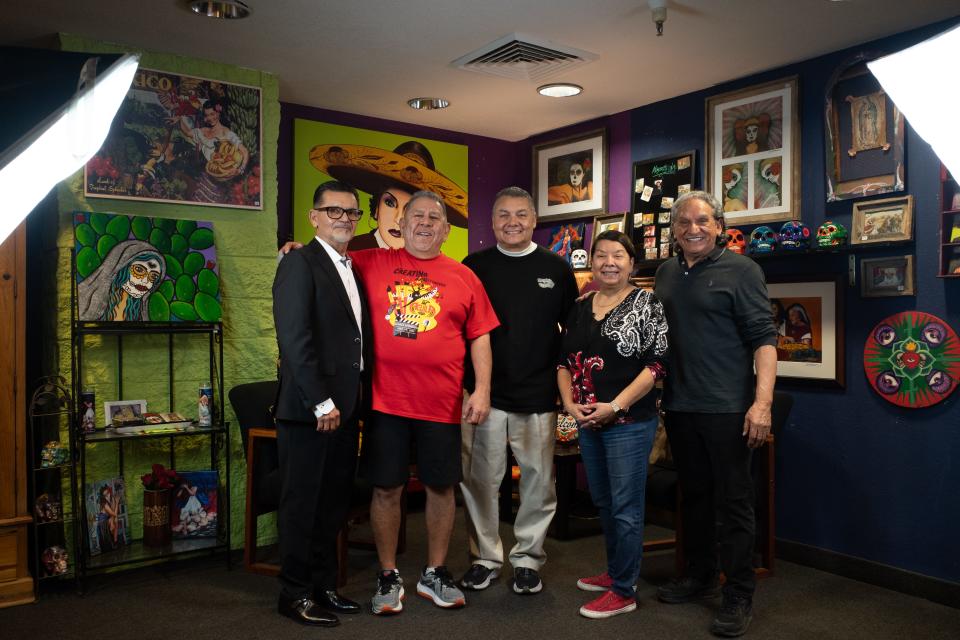 From left to right, José Leyba, Ray Martinez, Gil Bivens, Irma Payan and Roman Reyes pose for a photo after a video shoot with Alicia Nuñez, Interim President & Chief Executive Officer of Chicanos Por La Causa.