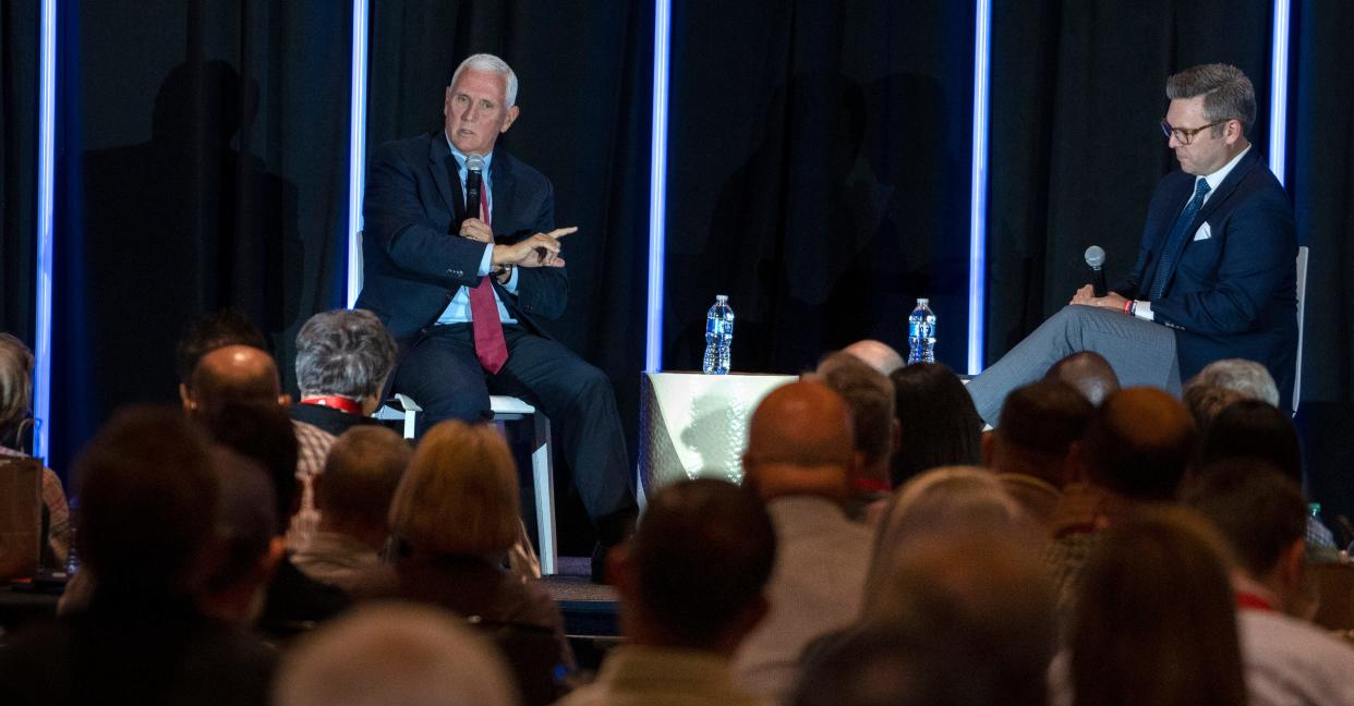 Mike Pence speaks at the Serving in the Public Square lunch during the Southern Baptist Convention, Tuesday, June 11, 2024 at the Indianapolis Marriott Downtown. Brent Leatherwood, right, lead The Ethics & Religious Liberty Commission (ERLC) event.